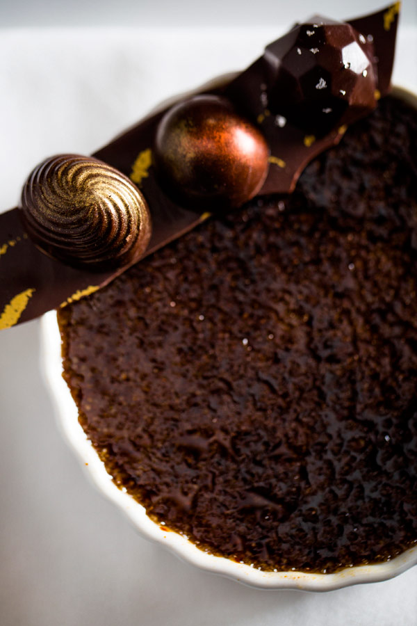 A chocolate dessert bar with hazelnut crumble